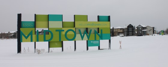 The Midtown entrance sign on a snowy day. Notice how the sign says "From the 300s" on the upper left. Ha! What a joke.